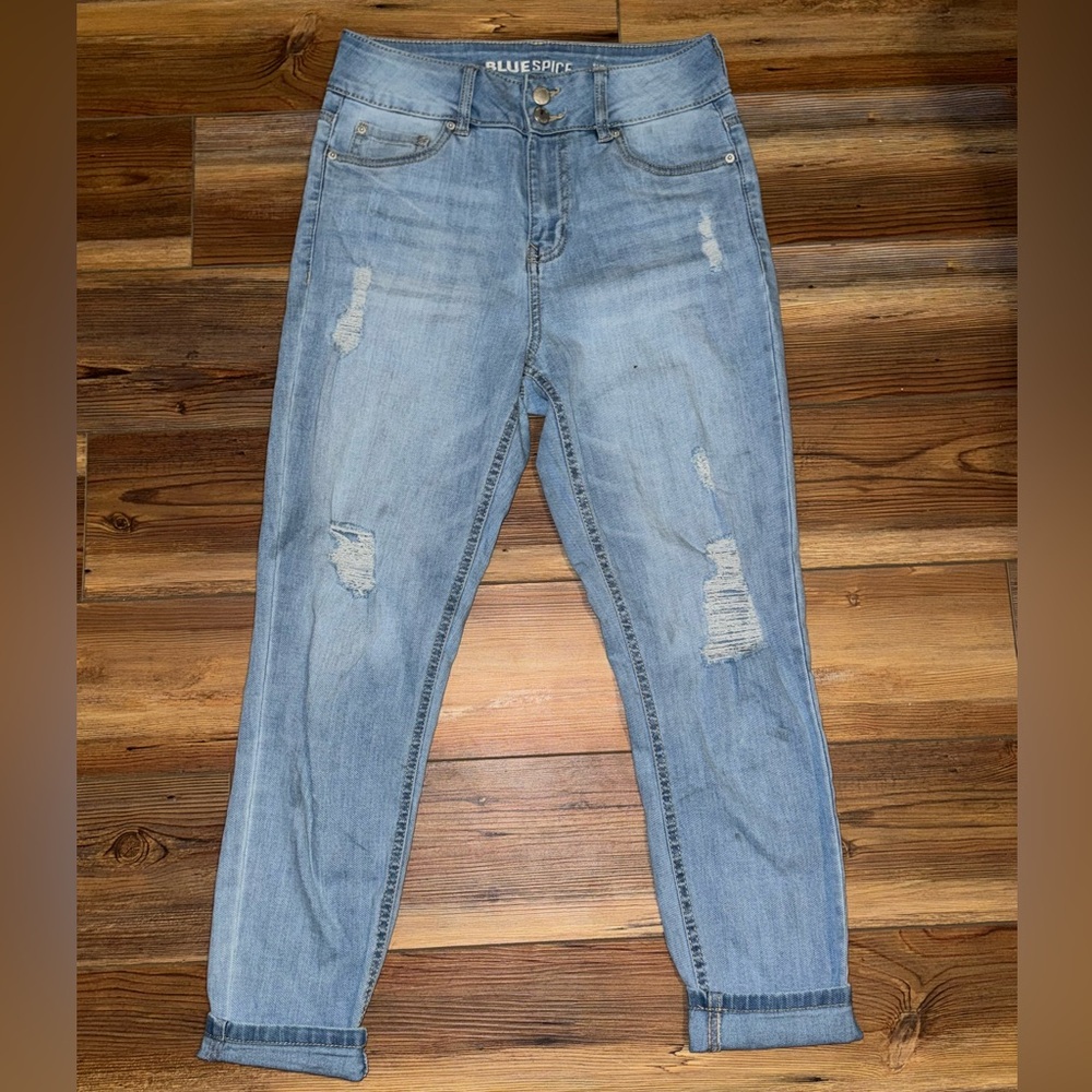 Light blue ripped jeans